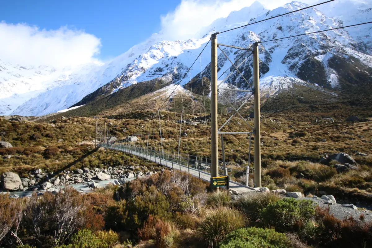 Swing bridge and snowy peaks on the Hooker Valley walk